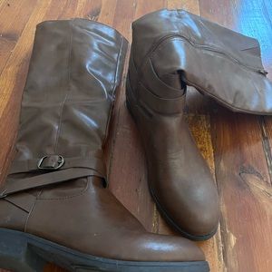 Brown gently worn boots.